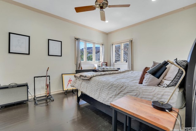 bedroom featuring crown molding, ceiling fan, radiator heating unit, and dark hardwood / wood-style floors