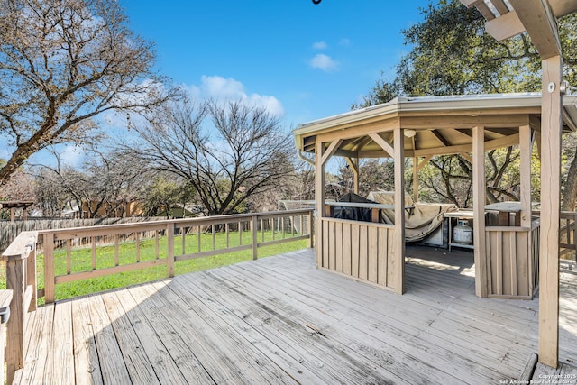 deck featuring a yard