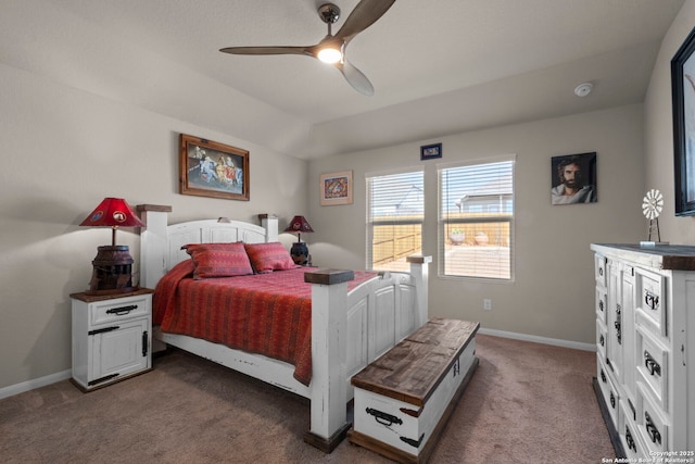 carpeted bedroom with vaulted ceiling and ceiling fan