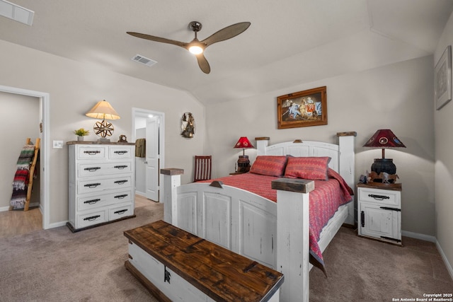 bedroom with ceiling fan, light colored carpet, and vaulted ceiling