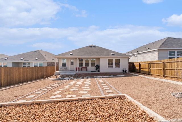 rear view of house featuring a patio