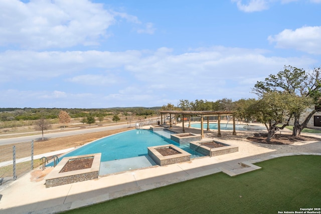 view of swimming pool featuring a pergola and an outdoor fire pit