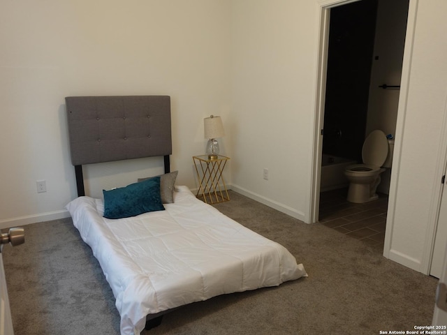 bedroom featuring dark colored carpet