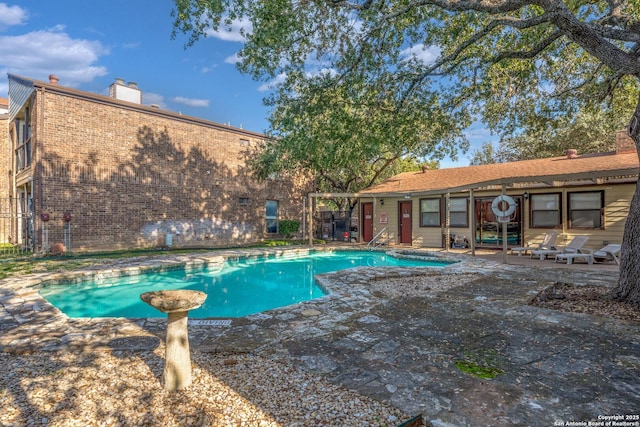 view of pool with a patio