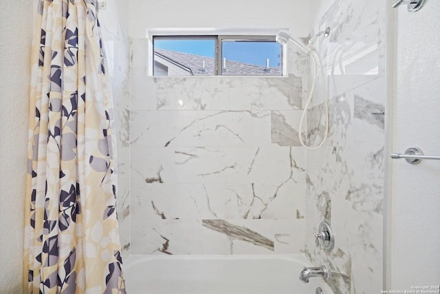 bathroom with shower / bathtub combination with curtain