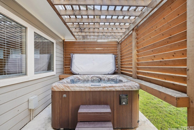 view of patio / terrace featuring a hot tub