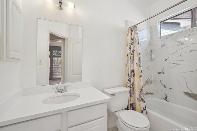 full bathroom featuring vanity, toilet, and shower / bath combo