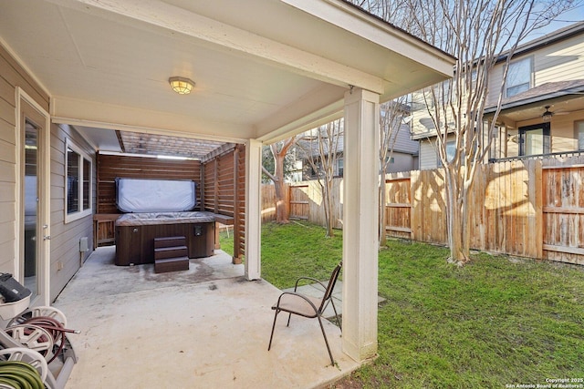 view of patio with a hot tub