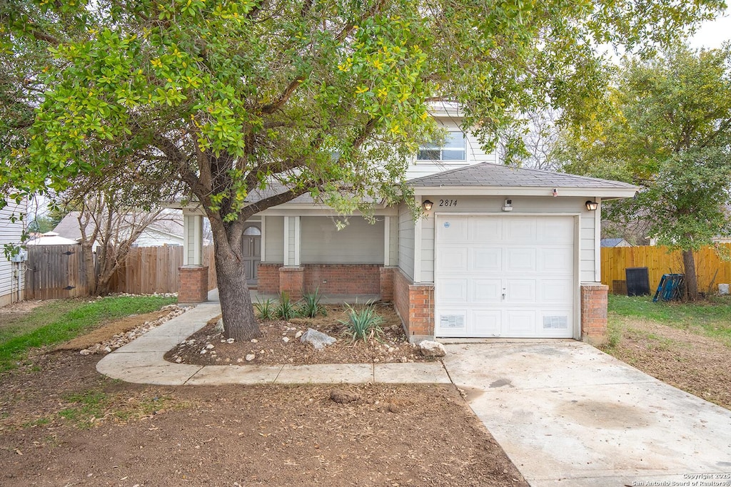 view of front of property featuring a garage