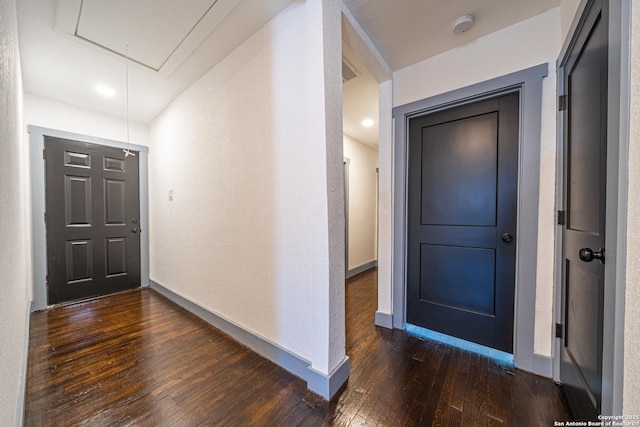 entrance foyer featuring dark hardwood / wood-style flooring