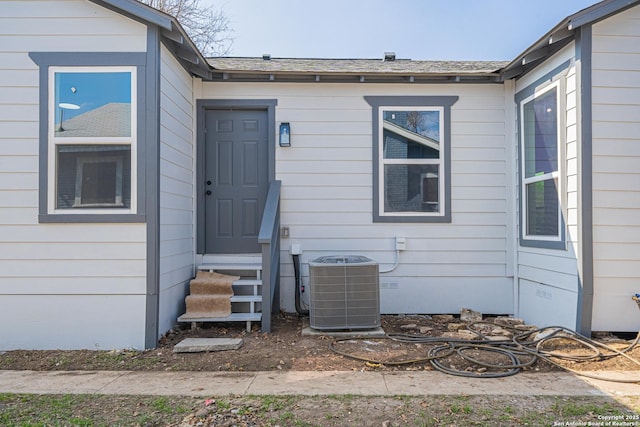 doorway to property with cooling unit