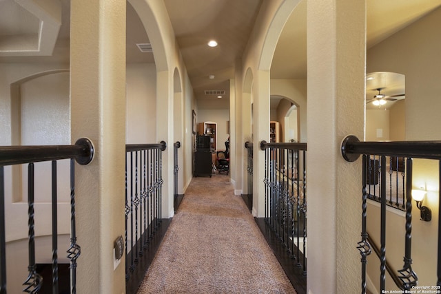 corridor with carpet floors