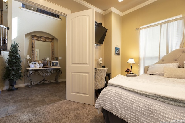 tiled bedroom featuring crown molding