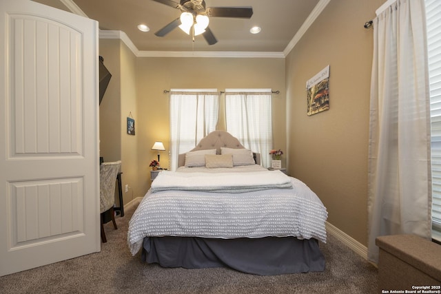 bedroom with crown molding, ceiling fan, and carpet flooring