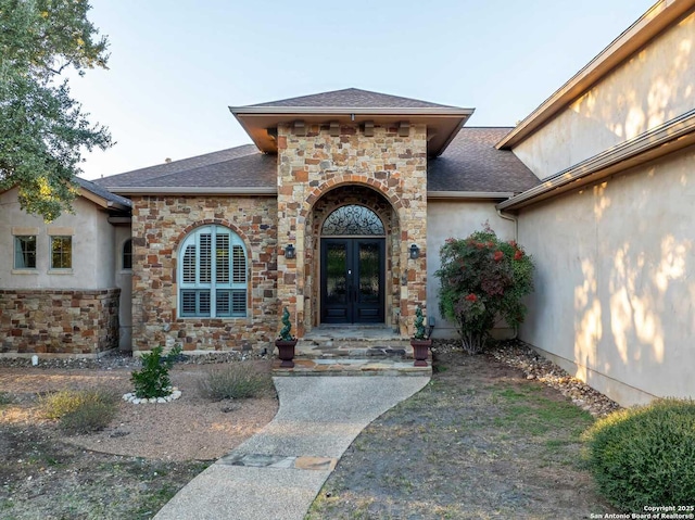 doorway to property featuring french doors