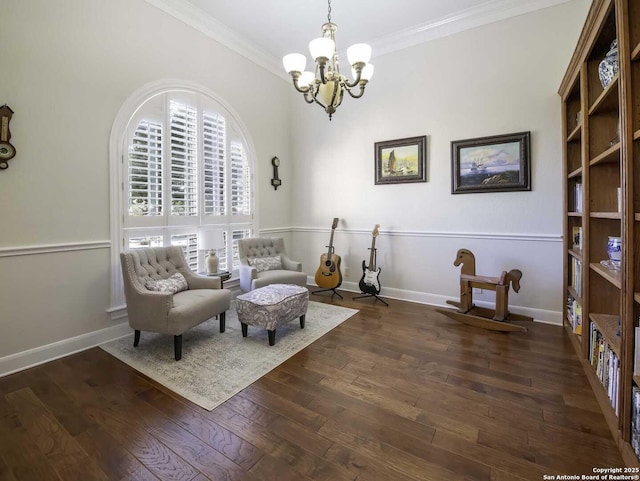 living area with crown molding, dark hardwood / wood-style floors, and a chandelier