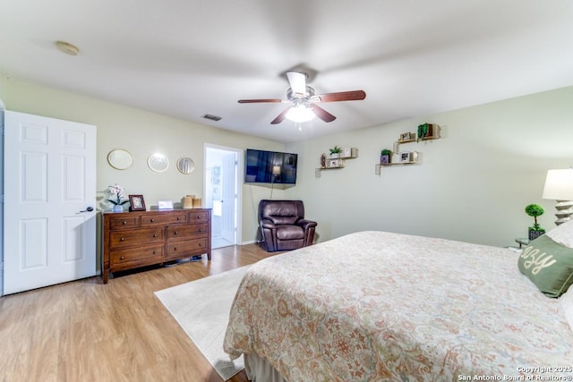 bedroom featuring hardwood / wood-style floors and ceiling fan