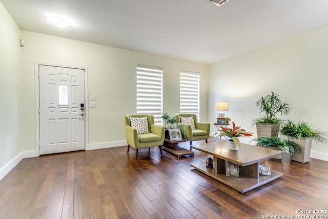 entryway with dark wood-type flooring