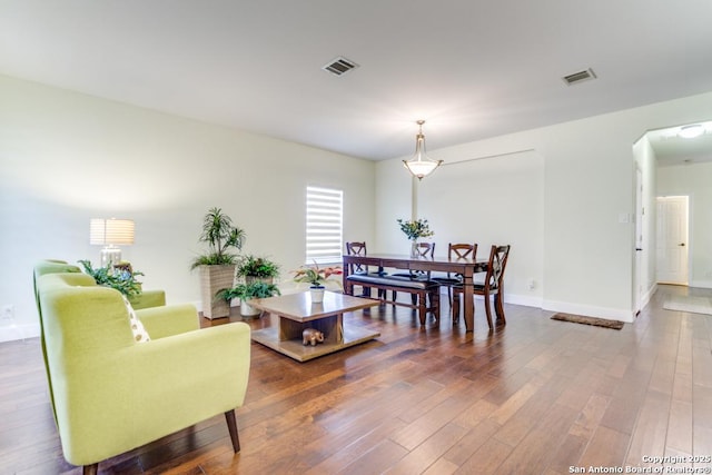 living room with dark wood-type flooring