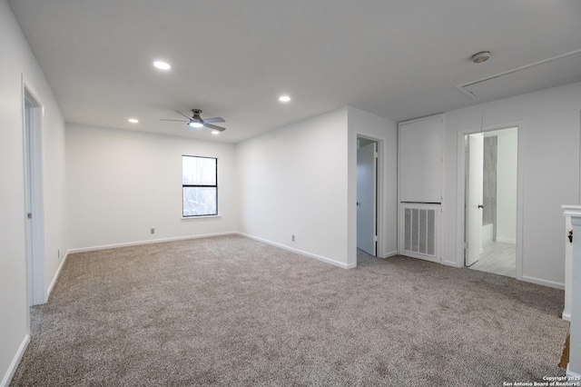 carpeted empty room with ceiling fan