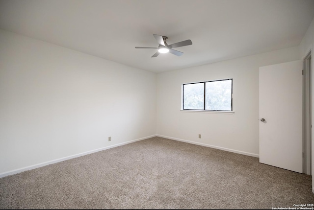 unfurnished room featuring carpet floors and ceiling fan