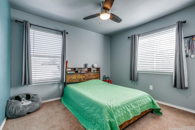 bedroom featuring ceiling fan and light colored carpet