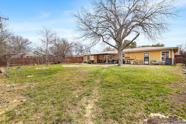 view of yard featuring a patio area and fence private yard