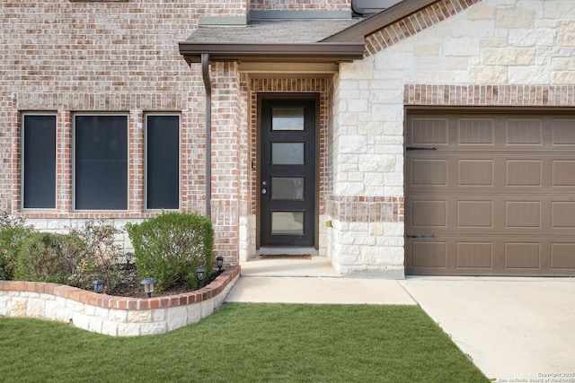 entrance to property featuring a garage