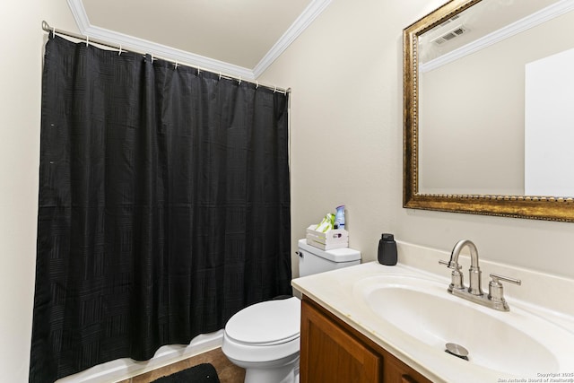 bathroom with ornamental molding, toilet, and vanity