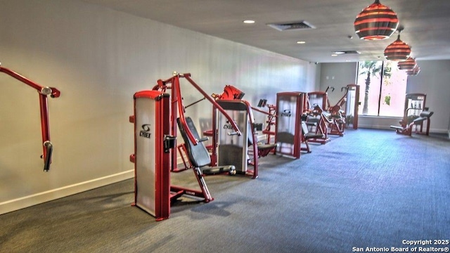 gym with dark colored carpet