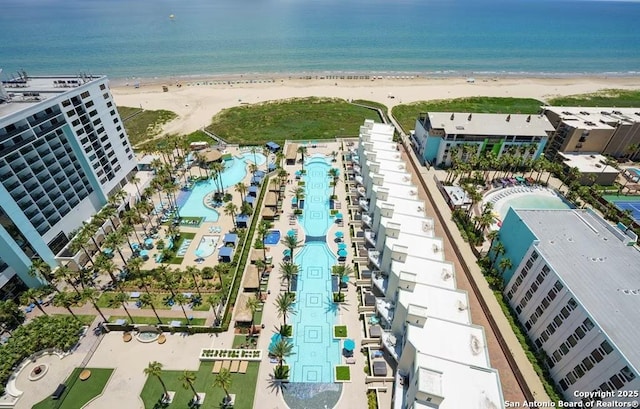 birds eye view of property featuring a view of the beach and a water view