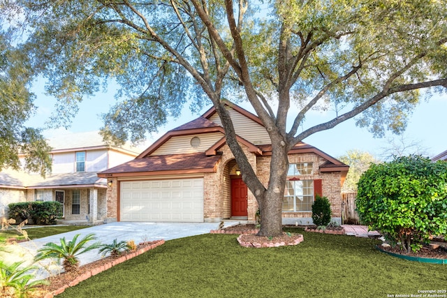 view of front of property featuring a garage and a front yard