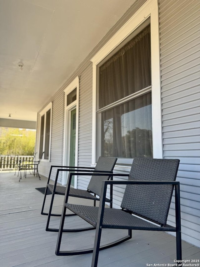 deck featuring a porch