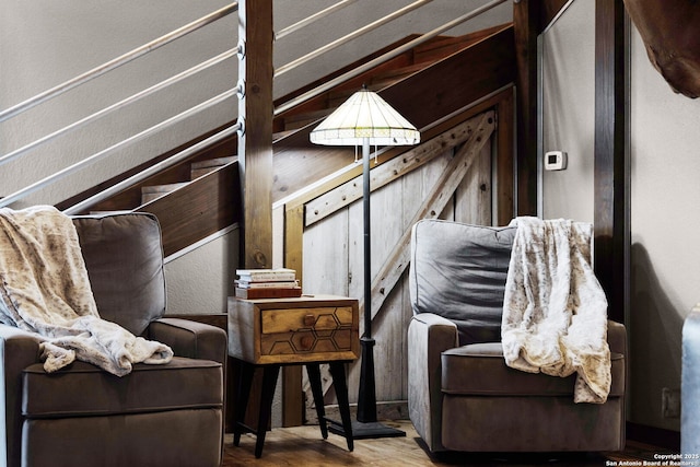 sitting room featuring wood-type flooring