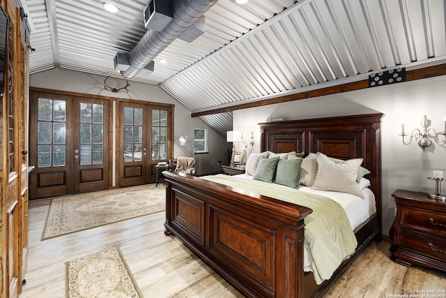 bedroom featuring french doors, vaulted ceiling, access to outside, and light hardwood / wood-style flooring