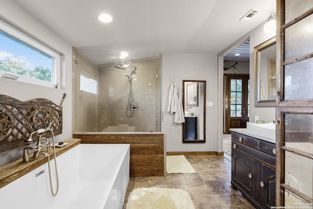 bathroom with vanity and plus walk in shower