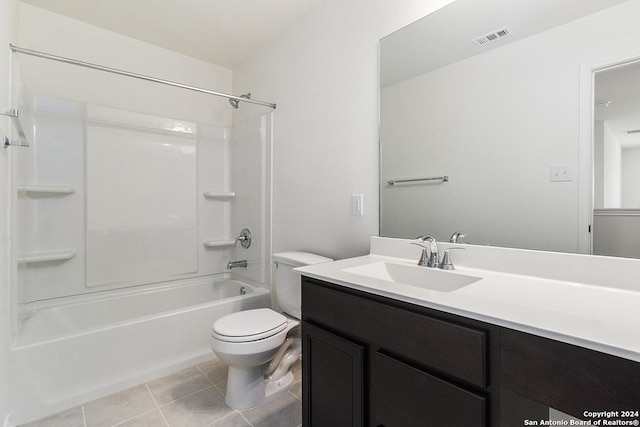 full bathroom featuring tile patterned flooring, vanity, shower / washtub combination, and toilet