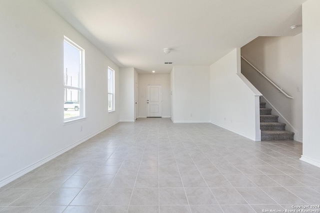 view of tiled spare room