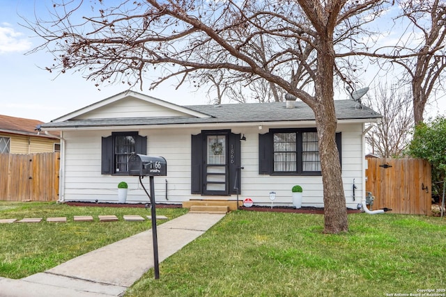 view of front of property with a front lawn