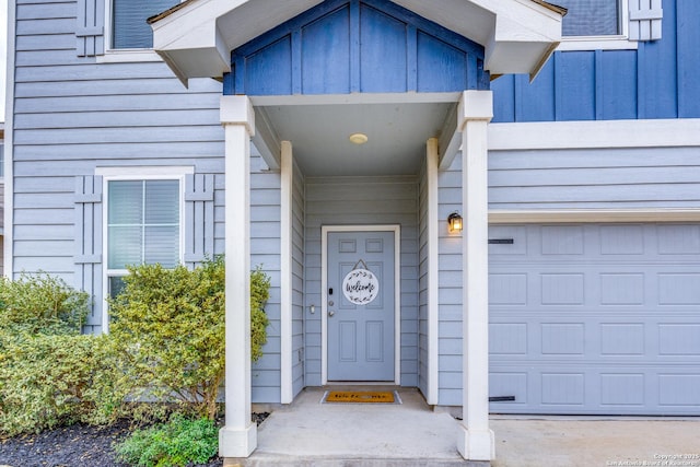 property entrance featuring a garage