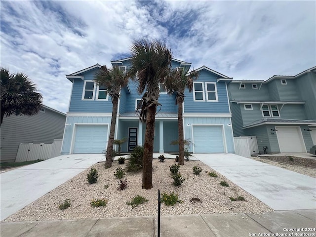 front of property with a garage