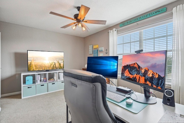 office featuring light colored carpet and ceiling fan