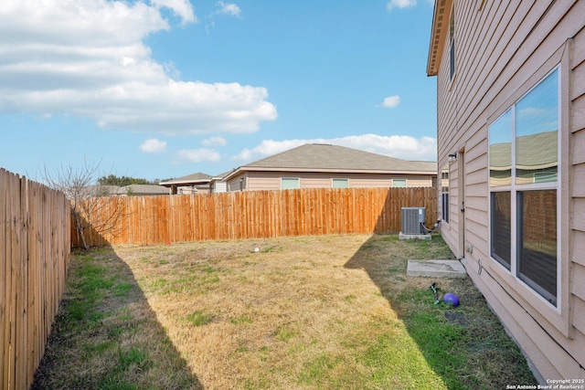 view of yard with central AC