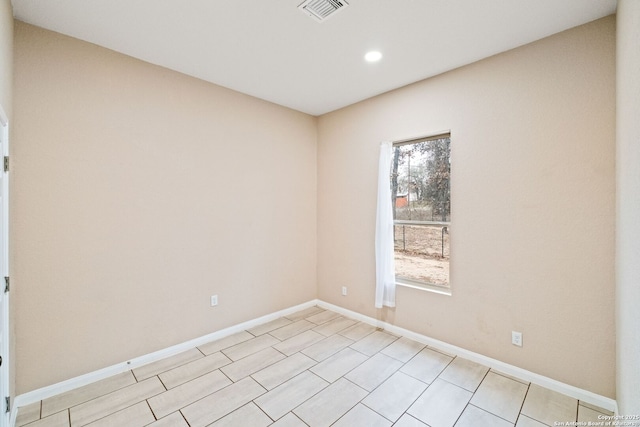 empty room featuring a wealth of natural light