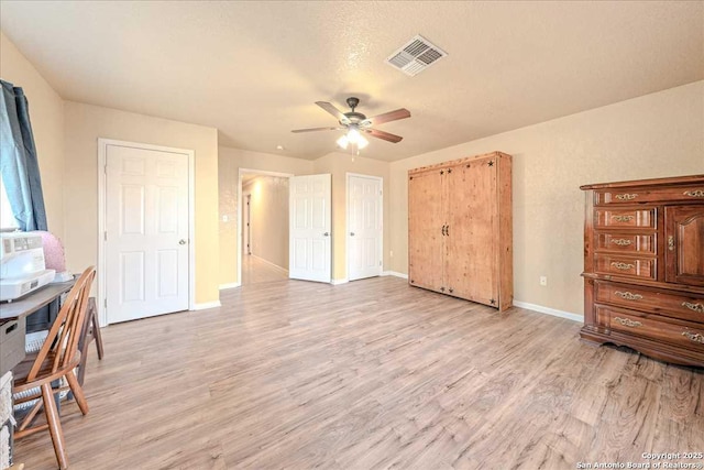 interior space featuring ceiling fan and light hardwood / wood-style floors