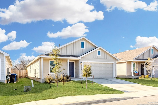 view of front facade featuring a garage and a front lawn