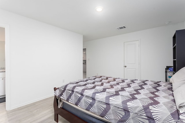 bedroom featuring light hardwood / wood-style flooring