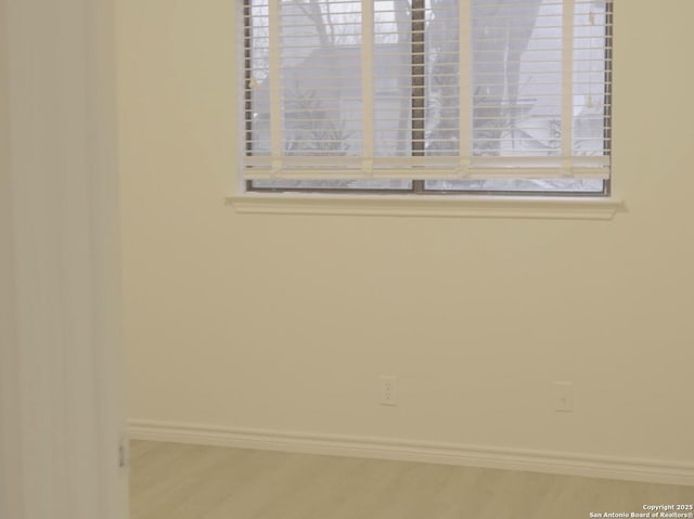 empty room featuring hardwood / wood-style flooring