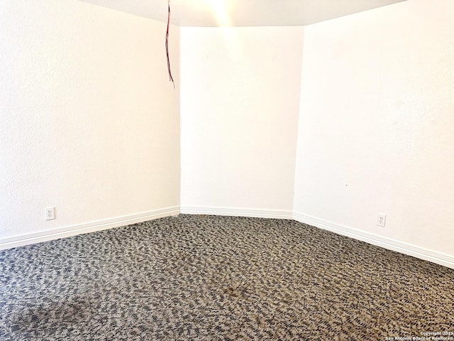 spare room with carpet floors