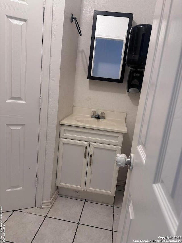 bathroom featuring vanity and tile patterned floors